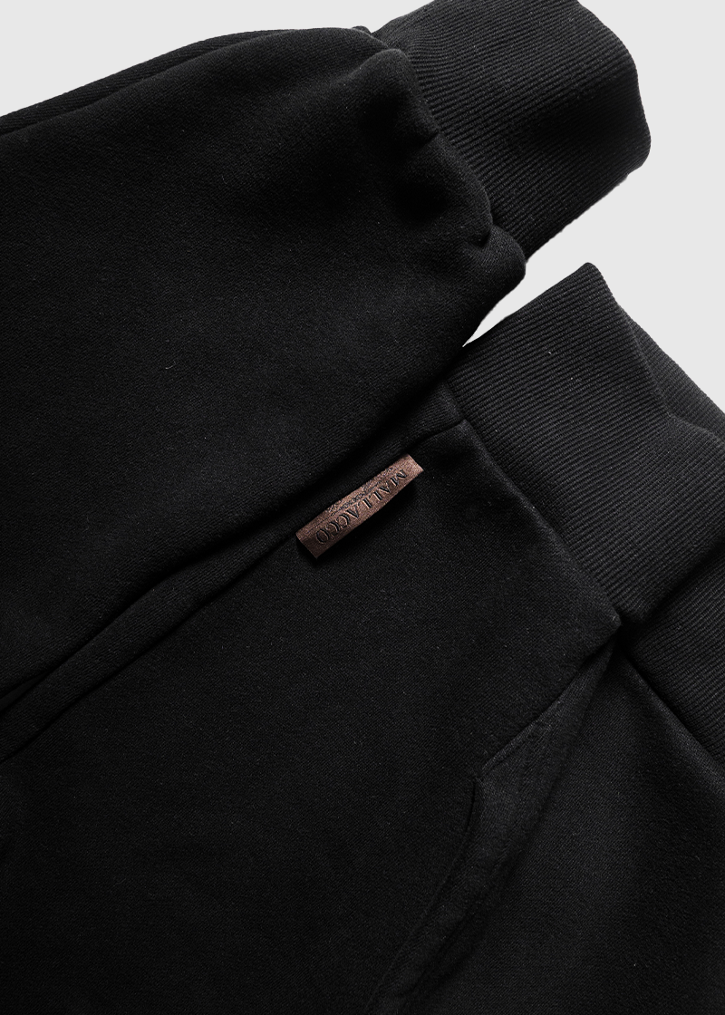 Mallacco black double zip hoodie with minimal branding and premium finish